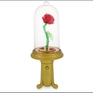 Belle enchanted rose light up musical spinner.